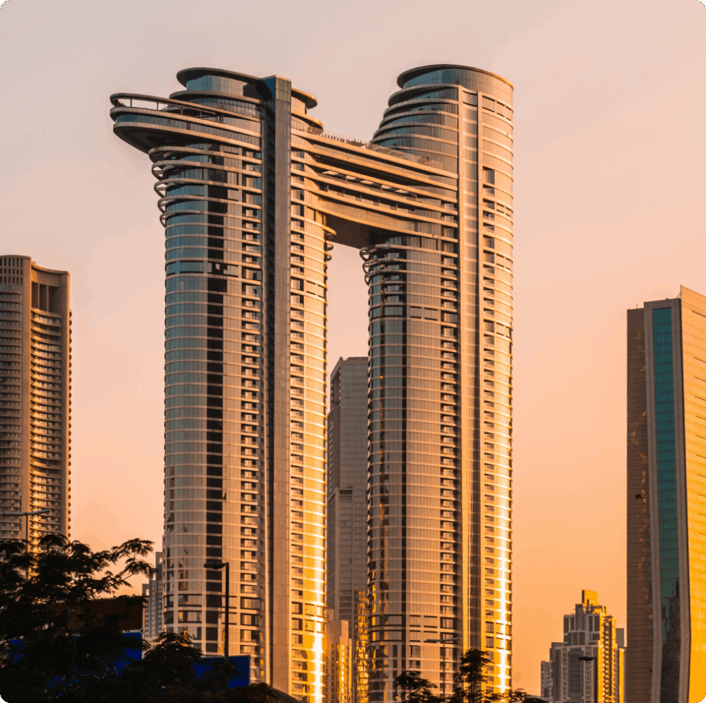 Sunset view of modern skyscrapers in Dubai, symbolising growth and VAT compliance for businesses.