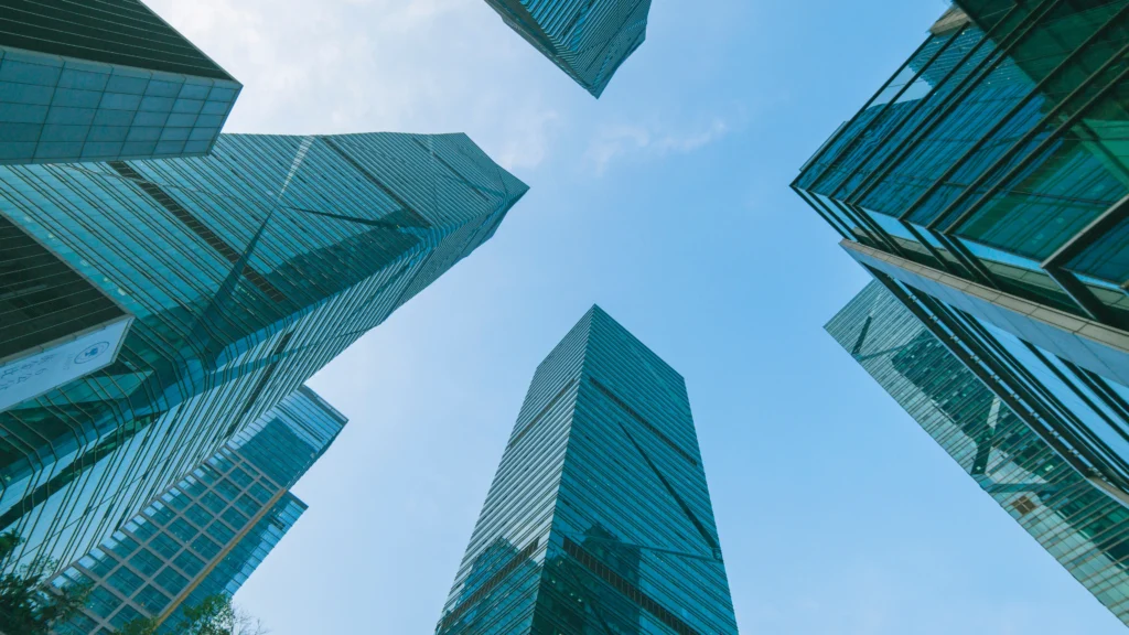 a view of several large buildings from below