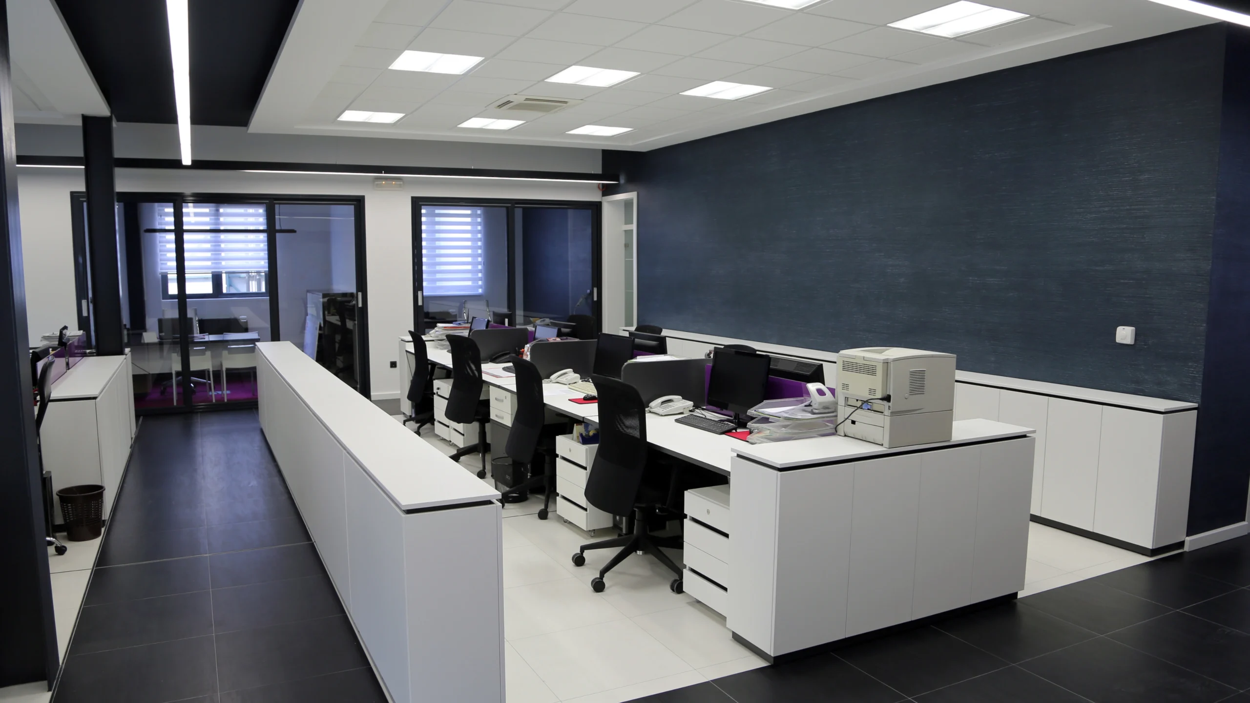 chairs and desks inside of an office in the UAE