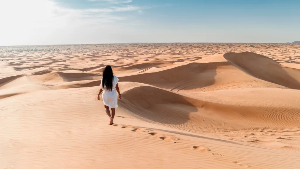 a woman enjoying her time during a Dubai desert safari