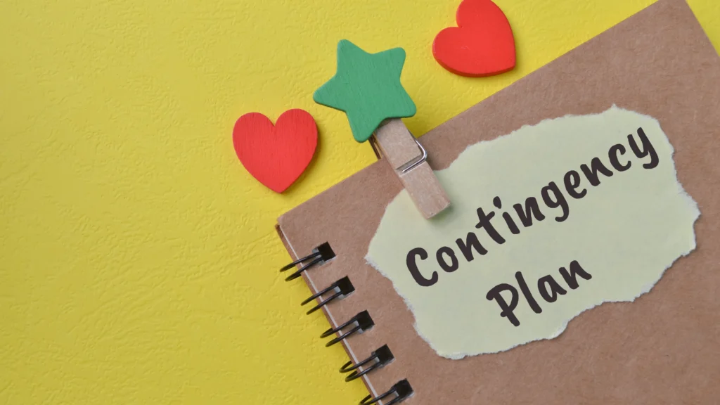 a cute notebook with accessories that says "contingency plan"