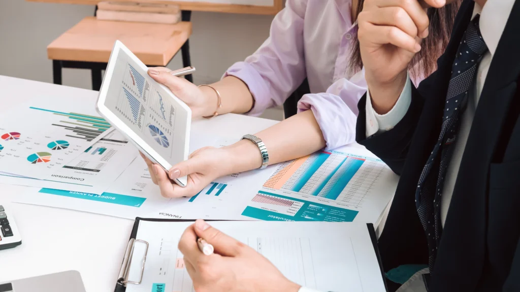 businessman going over information with a tax consultant