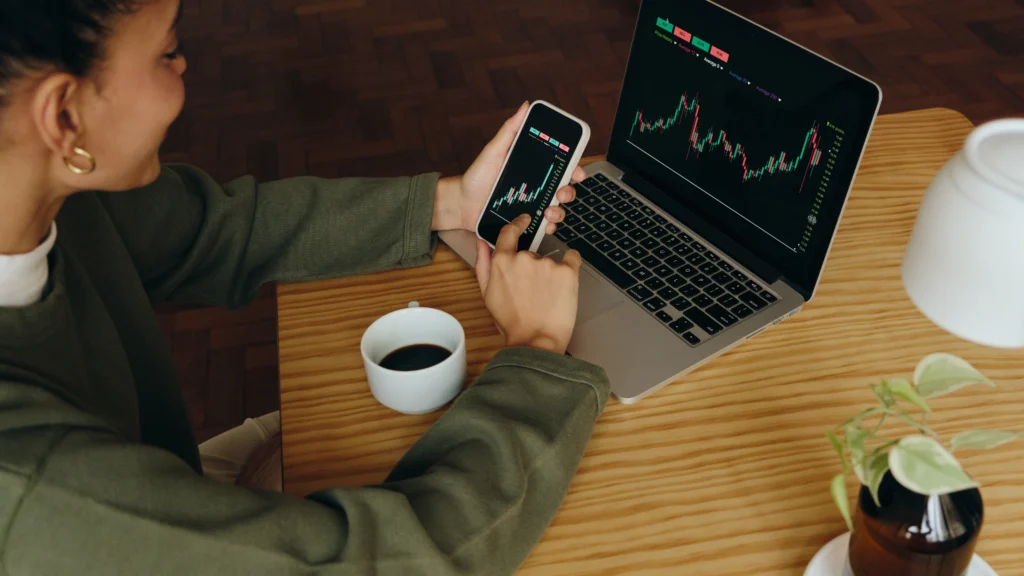 woman managing virtual assits while drinking coffee