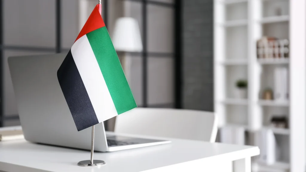 the UAE flag on someone's office desk in the DIFC