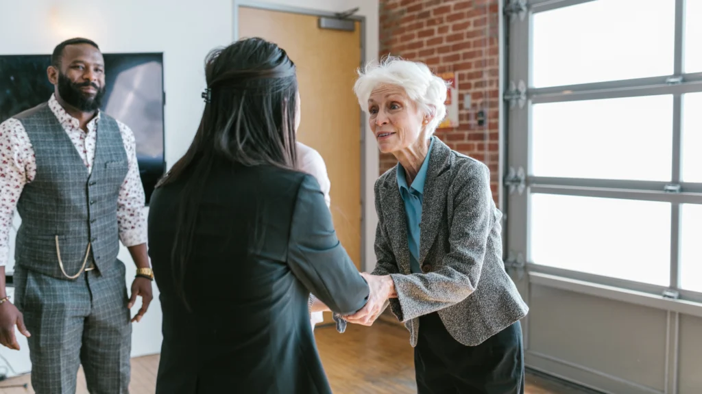 People meeting with an investor for their company