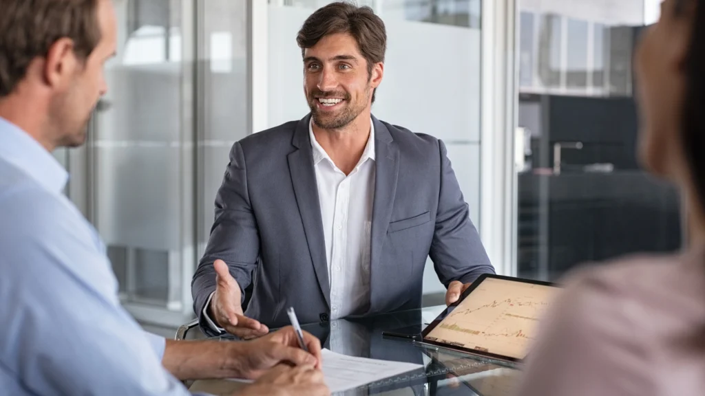 a consultant talking to two people about something