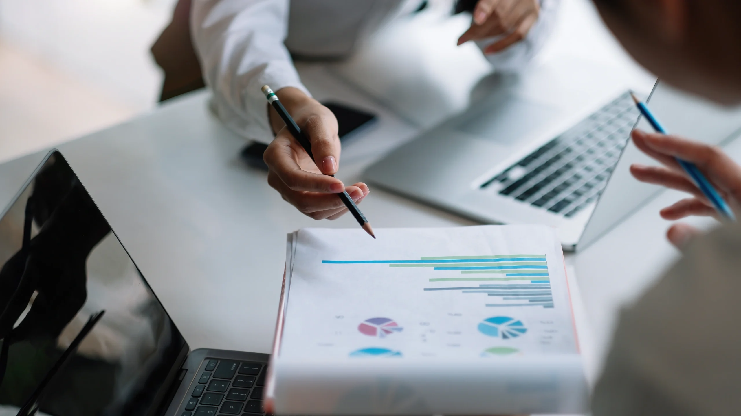 two people going over information to help them make a business decision