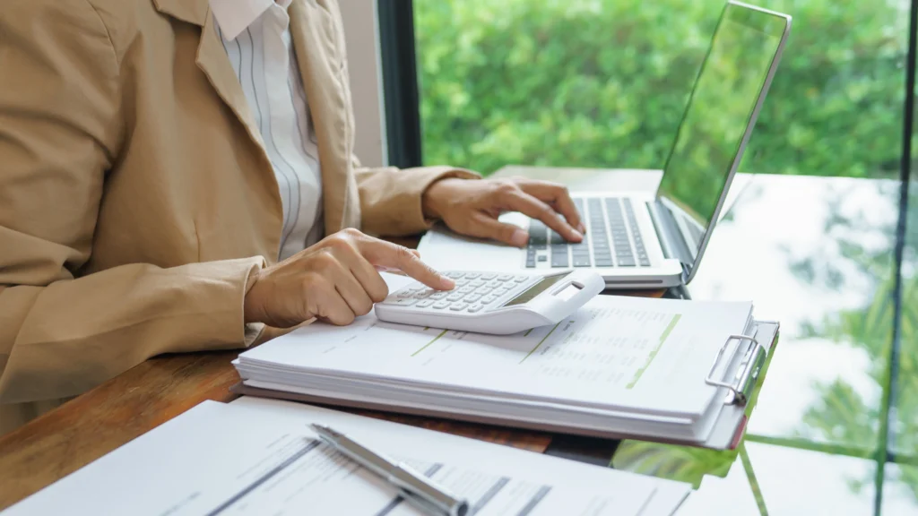 person calculating cost of the work being done
